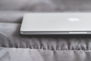 closed-macbook-laptop-on-a-sofa-picjumbo-com